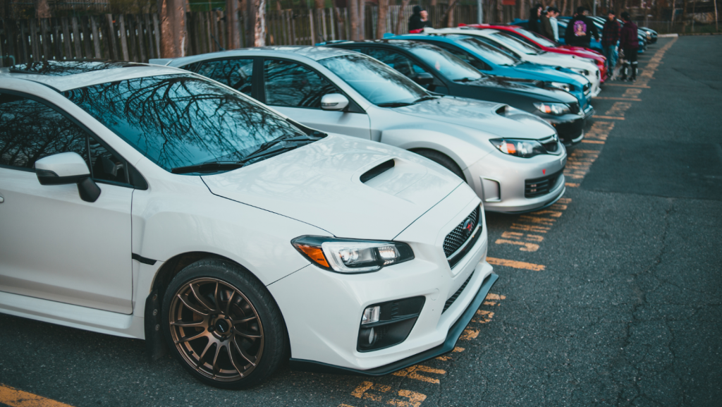 Cars sitting in a parking lot